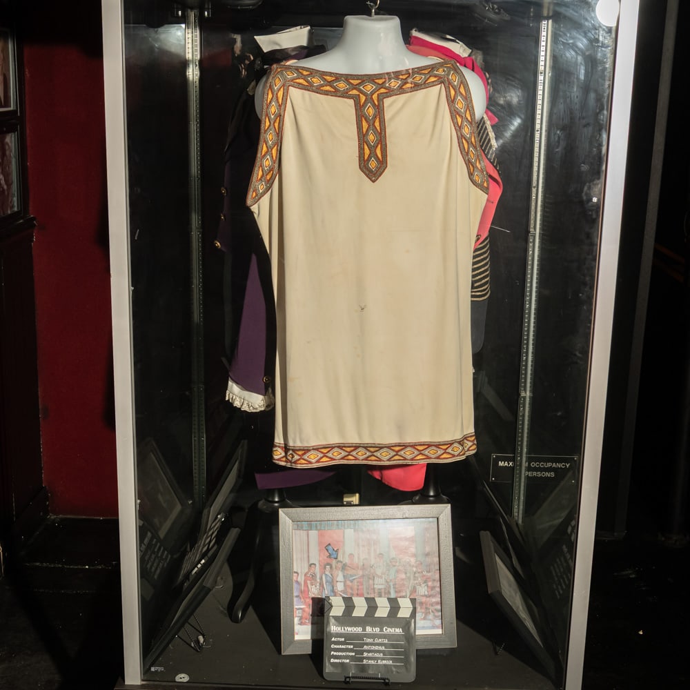 Tony Curtis Spartacus Costume: I AM SPARTACUS! Tony Curtis screen worn costume from the 1960 movie Spartacus. Curtis' character was Antonius. In good condition, comes with display torso, a framed 11 X 14 color photo of the cast