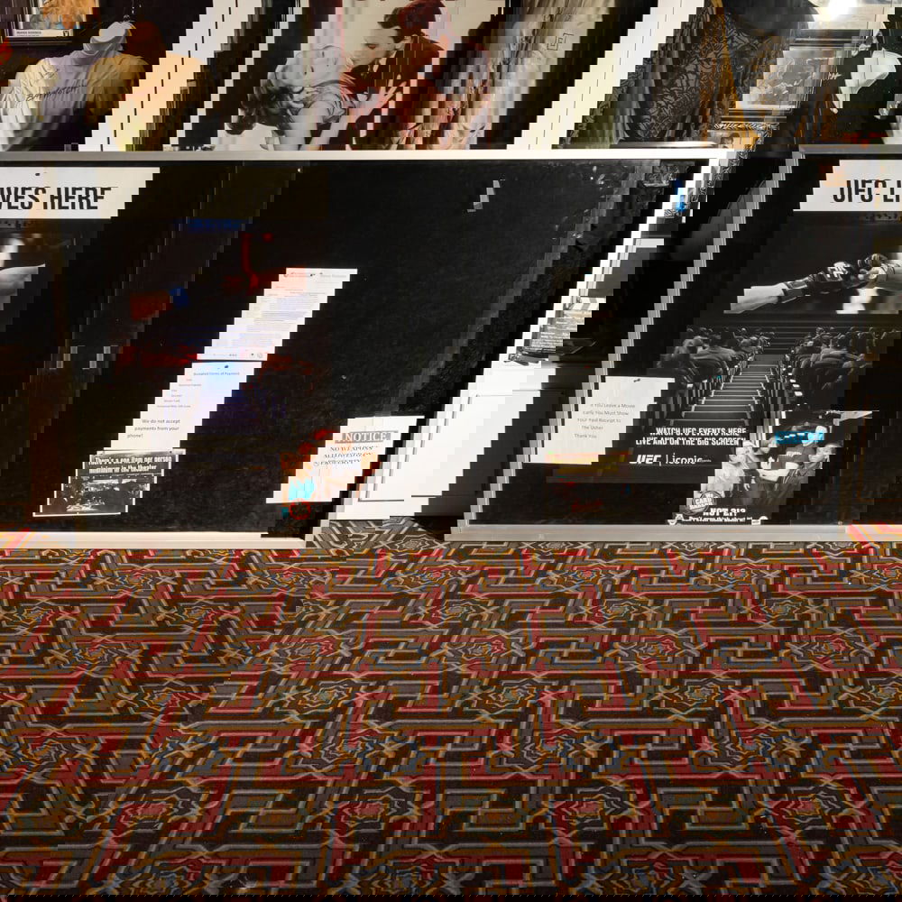 Large Wall Mounted Display Case: Wall display case. Aluminum frame with two large glass sliding doors. Good condition. Measures 8' long x 48" tall x 3.5: Please use photos to judge condition and bid accordingly. Please note: Buyer is