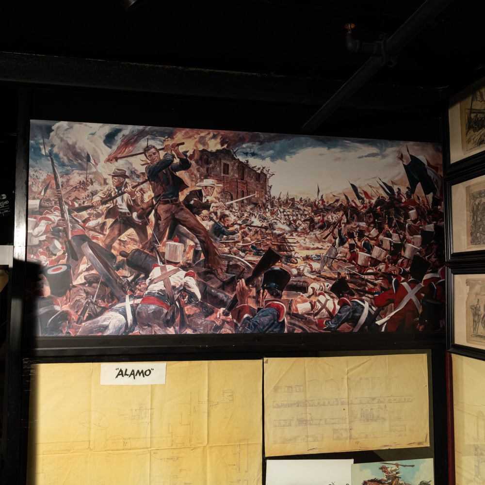 Large 1960 The Alamo Movie Illustration Print: Large movie theater print for the 1960 movie, The Alamo. Action illustration depicts stars John Wayne, Richard Widmark, and Laurence Harvey in the middle of a huge battle. In good condition.