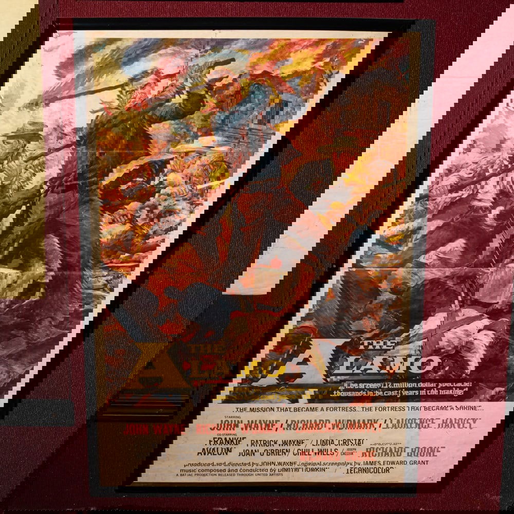 Original The Alamo Framed One Sheet Poster: Original one sheet movie poster for the 1060 production of The Alamo starring John Wayne. In good folded condition, poster has been framed under glass. Measures 28"x41". Please use photos to judge