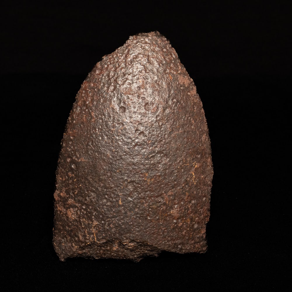 Civil War Parrott Projectile Fragment: This heavy cast iron fragment is a significant relic from the American Civil War, specifically identified by the hand-painted "Parrott" and "U.S. 100lb" markings. The piece originates from a 100-pound