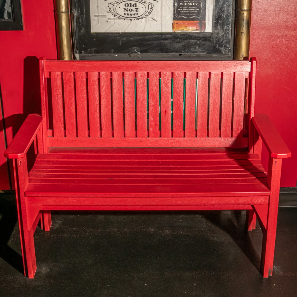 Red Wood Bench: Red painted wood bench with slat back in good condition. Measures 48" wide X 36" tall X 25" deep. Please use photos to judge condition and bid accordingly. Please note: Buyer is responsible for remova