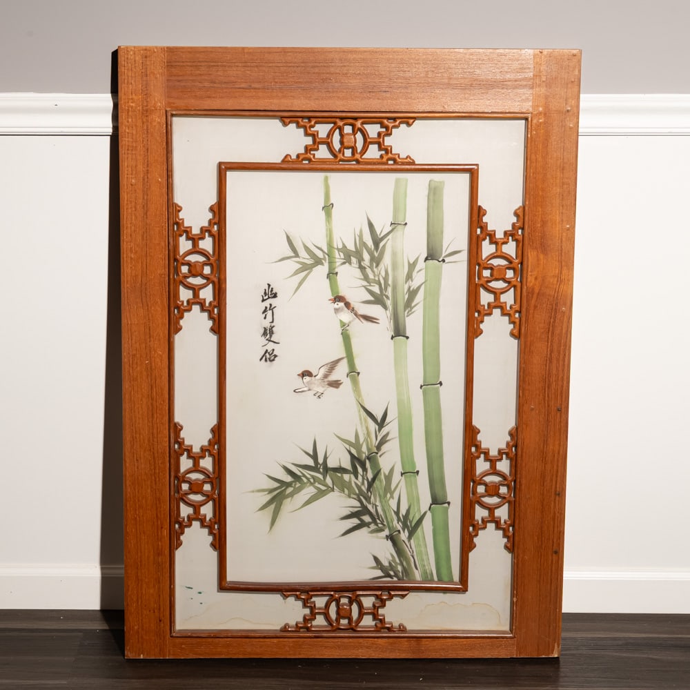 Oriental Bamboo & Birds Wood Wall Art: This elegant piece of Oriental-style wall decor features a delicate ink and wash-style painting of two birds perched among slender bamboo stalks, accented by traditional calligraphic script. The artwo