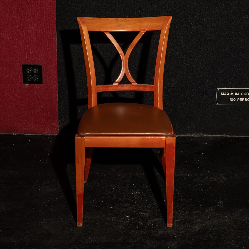 10 Wood Chairs With Naugahide Seats: Set of 10 matching wood chairs with brown Naugahide seats. In used condition. Chairs measure 17" x17" x 34" Please use photos to judge condition and bid accordingly. Please note: Buyer is