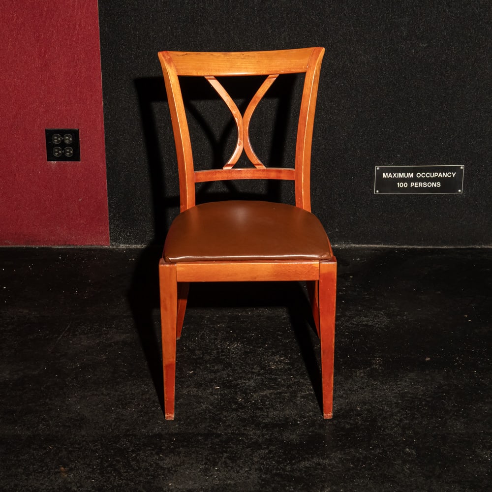 10 Wood Chairs With Naugahide Seats: Set of 10 matching wood chairs with brown Naugahide seats. In used condition. Chairs measure 17" x17" x 34" Please use photos to judge condition and bid accordingly. Please note: Buyer is