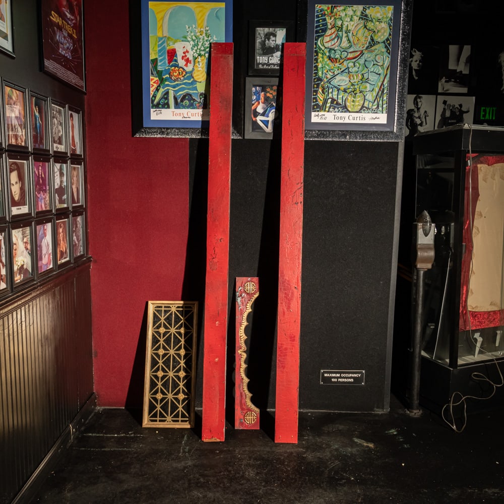 4 Piece Ornate Chinoiserie Architectural Set: This lot features a striking four-piece architectural salvage set, likely part of a grand interior doorway or theater set design reflecting a mid-century Chinoiserie style. The collection includes two