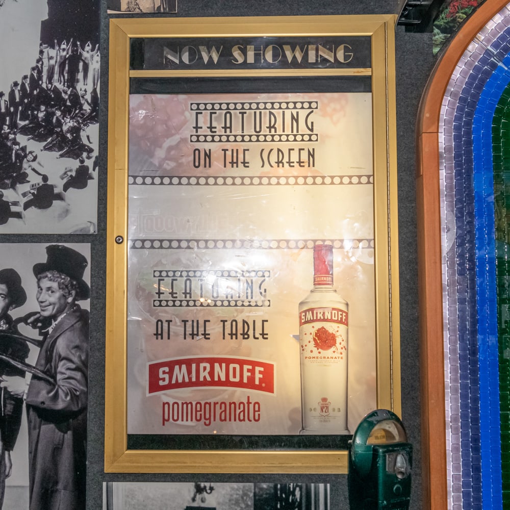 Now Showing Movie Poster Case: Gold framed back lit Now Showing poster case in good condition with lock and key. Measures 32" wide, 57.5" tall, 3.5" deep. Please use photos to judge condition and bid accordingly. Please note: Buyer