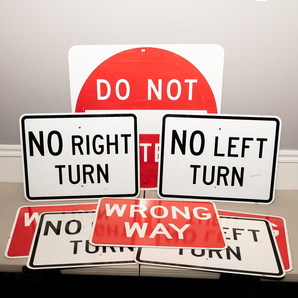 Lot of 8 Vintage Metal Traffic Signs: This impressive grouping consists of 8 authentic municipal-style enameled metal signs, including a large circular "DO NOT ENTER" sign, multiple "NO RIGHT TURN" and "NO LEFT TURN" pieces, and two "WRON