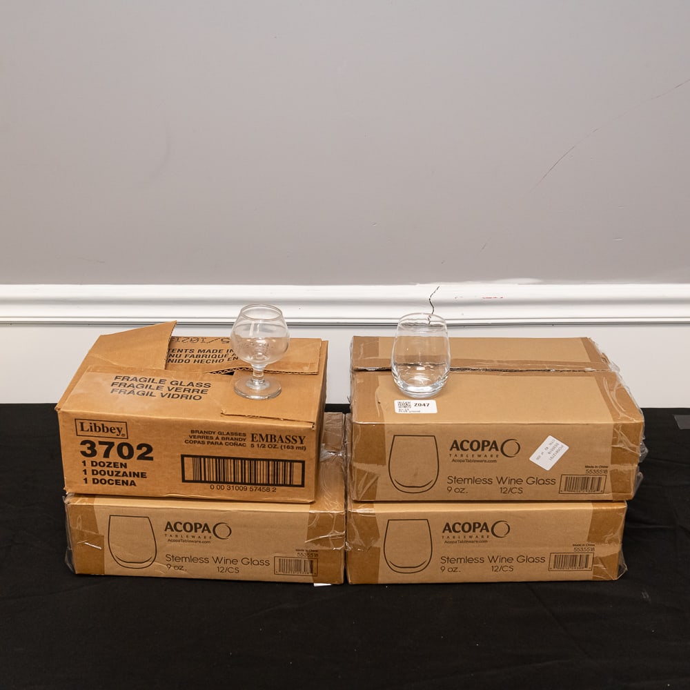 60pc Libbey Brandy & Acopa Wine Glasses: This collection features professional-grade glassware essential for any well-appointed bar or tasting room, consisting of 24 Libbey "Embassy" 5.5 oz brandy snifters and 36 Acopa 9 oz stemless wine gla