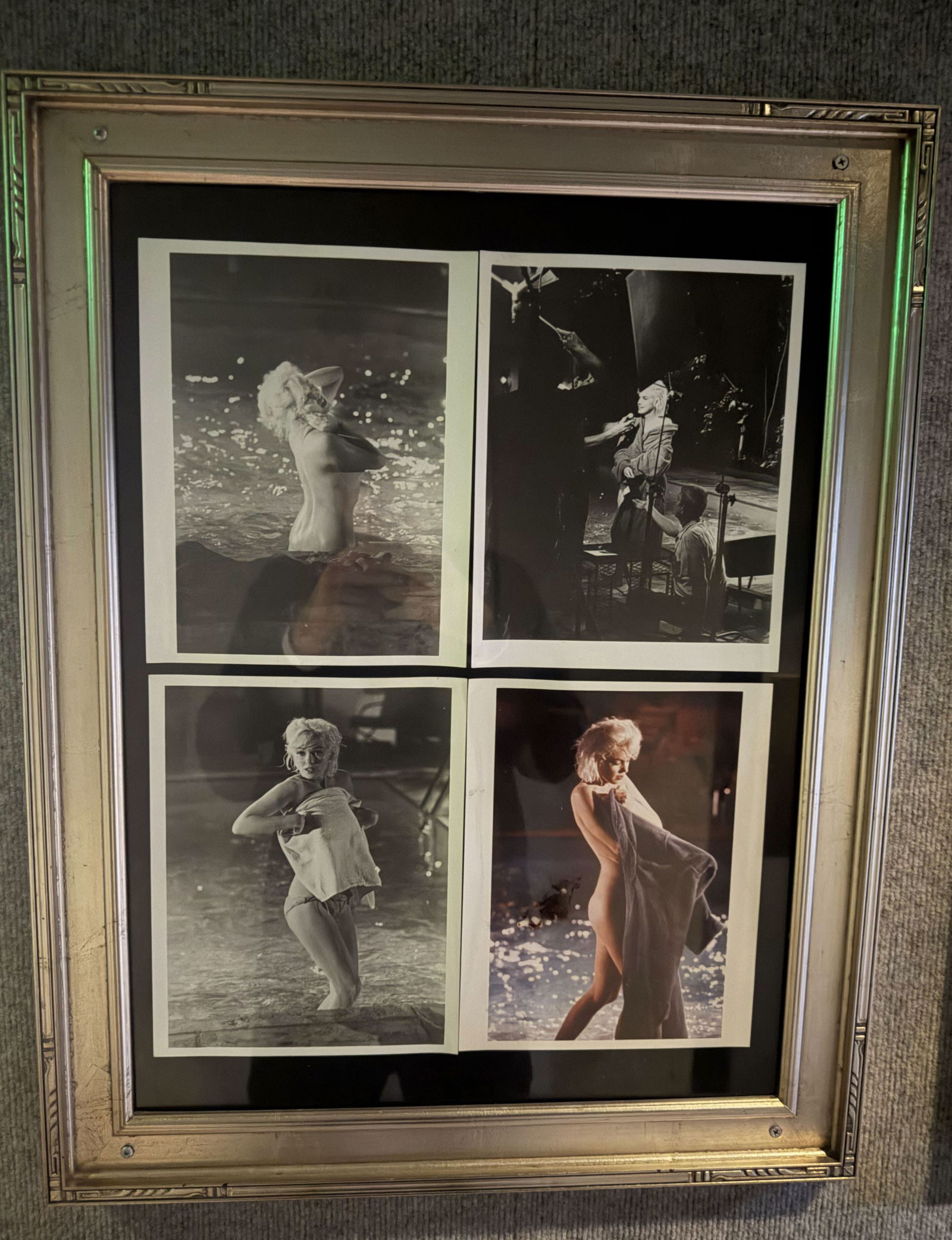 Marilyn Monroe Framed Photo Prints 4: Framed under glass four 8 X 10 B & W photo prints of Monroe. In good condition. Frame has screw holes where it was mounted to the wall. Frame measures 21.5" wide, 28" tall. No shipping on this item. C