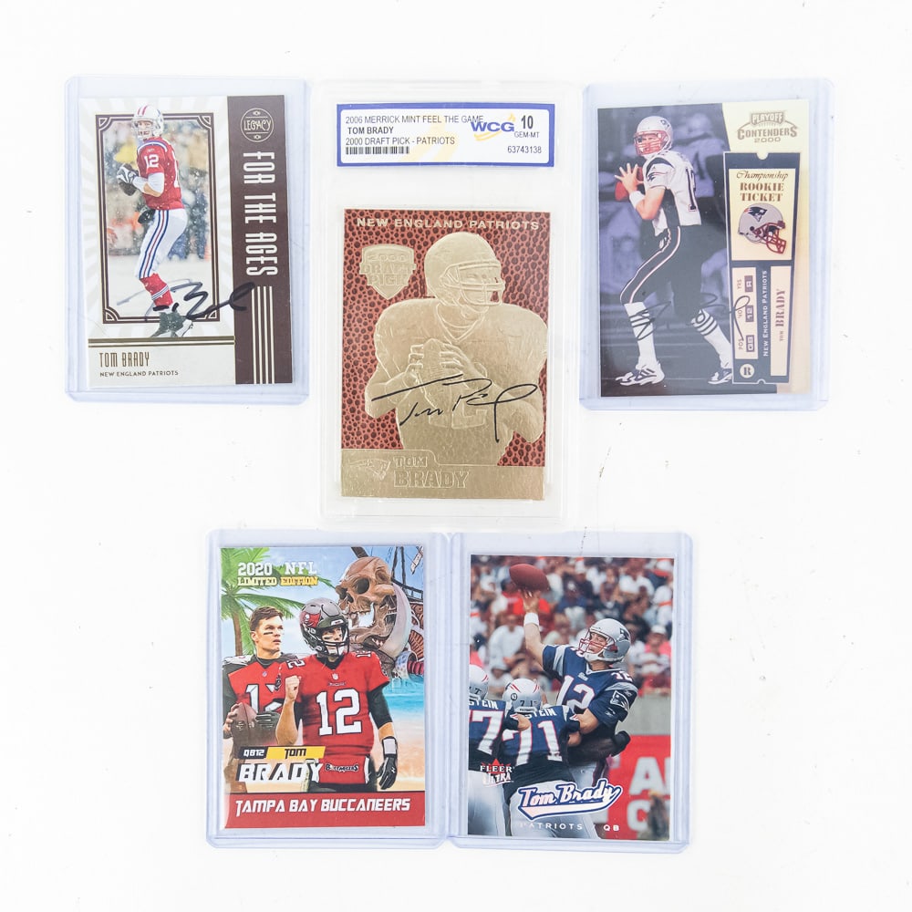 '20 Panini Legacy Tom Brady Autographed Card &More: Collection features 2020 Panini Legacy Tom Brady AUTOGRAPHED football card # FTA-TB with AAA certification #A41606, Tom Brady Playoff Contenders Rookie Ticket Auto FACSIMILE reissue card, 2005 Fleer U