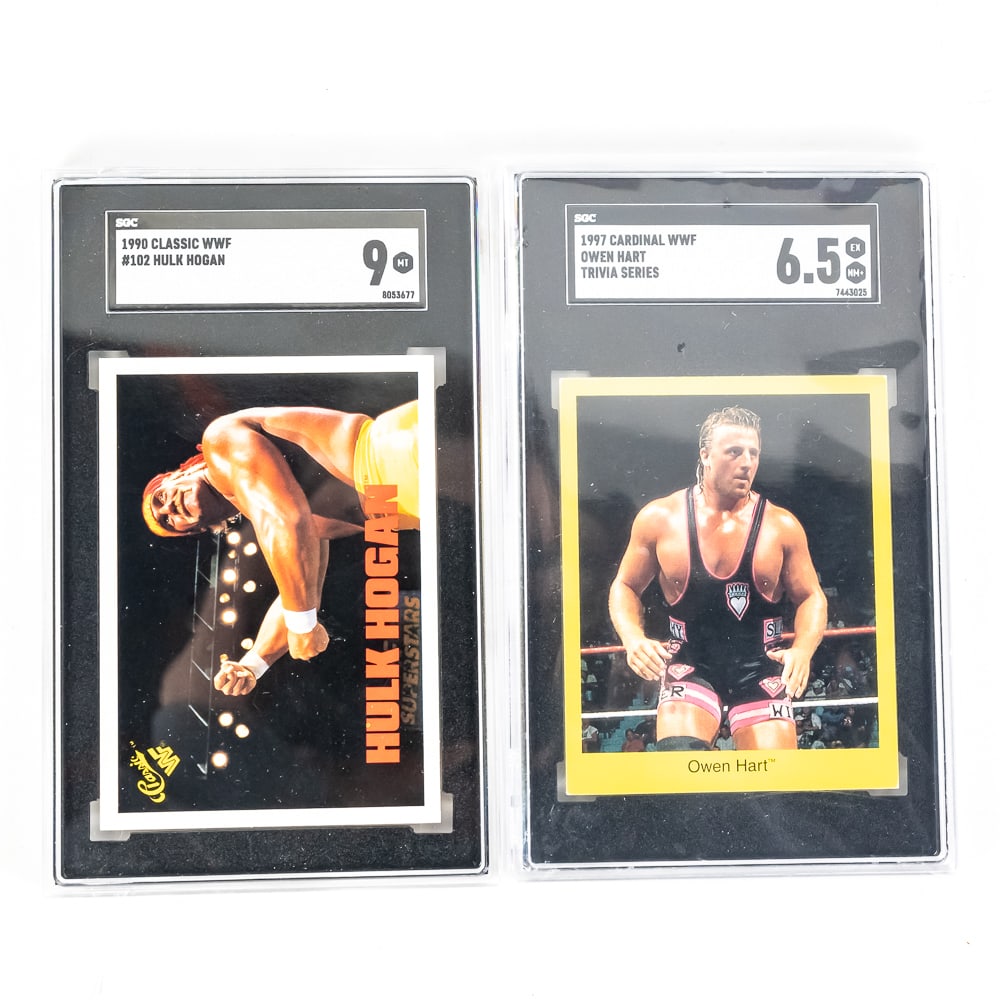 90 Classic WWF #102 Hulk Hogan SGC 9 Owen Hart 6.5: Classic WWF Sport Card collection showcasing 1990 Classic WWF #102 Hulk Hogan SGC 9 AND 1997 Cardinal WWF Owen Hart Trivia Series SGC 6.5. Perfect addition to your collection, fantastic gift idea.