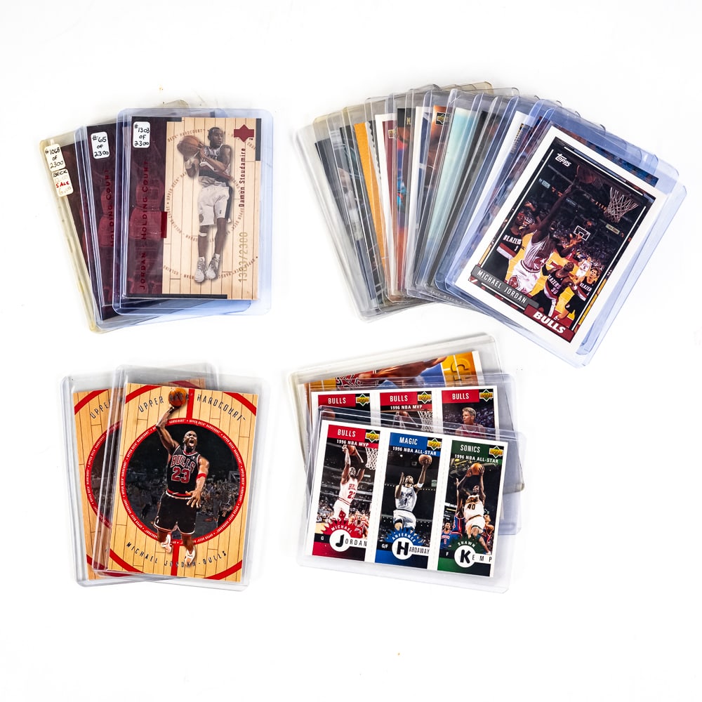 (22) Assorted Michael Jordan Cards UD Hard Court +: Collection of (22) assorted Michael Jordan raw cards including (3) Upper Deck Holding Court /2300, 1993 Upper Deck #141, 1995-1996 Flair, (2) 1999 Upper Deck Hard Court, Upper Deck The Big Picture, Wo