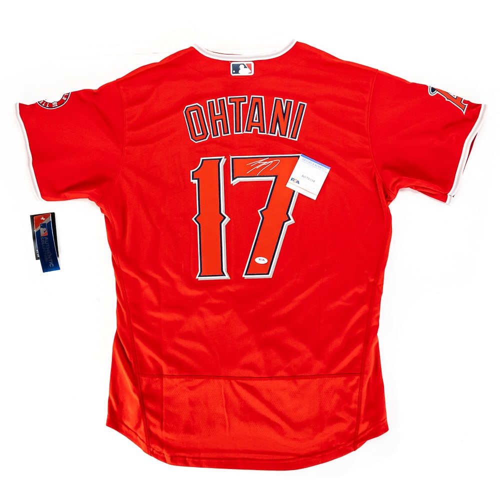 Shohei Ohtani AUTOGRAPHED L.A. Angels Jersey w PSA: "SHO-TIME" Shohei Ohtani Autographed "Los Angeles Angels" #17 NIKE authentic Jersey with PSA authentication. Strong bold SILVER Rookie felt tipped signature centralized on #7. Perfect addition to any
