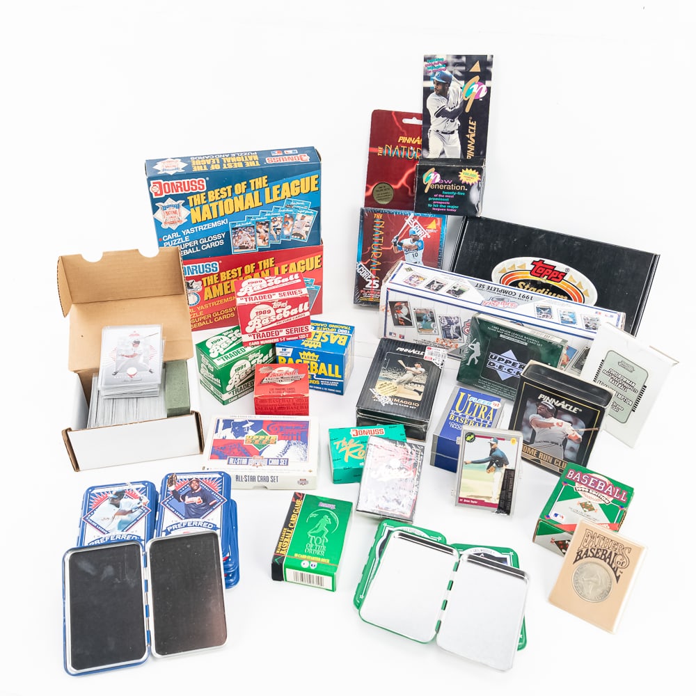 Eclectic MLB Baseball Card Collection Sets Packs +: Eclectic collection of assorted MLB Baseball card sets featuring NIB sealed 1993 Score Pinnacle DiMaggio 30 Card Set in Tin, Pinnacle Home Run Club set, Sealed 91 Fleer Ultra Update, 1990 Fleer Update