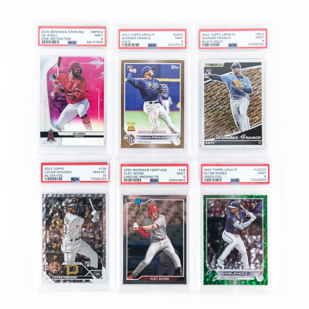MLB PSA Slabbed Assortment Wander Franco Adell: Showcasing 2023 Topps #238 Liover Peguero Silver Foil, 2022 Topps Update #BG2 Wander Franco Black Gold PSA 9, 2022 Topps Update #US42 Wander Franco Gold PSA 9, 2022 Topps Update #US223 MJ Melendez Gre