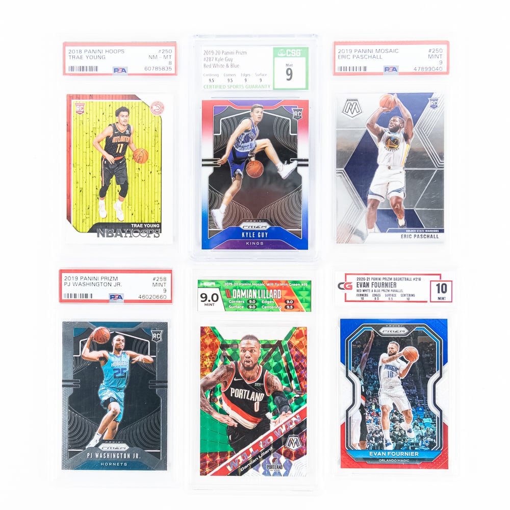 (6) NBA Slabbed Card Assortment Young Lillard Guy+: Featuring 2019 Panini Prism #287 Kyle Guy Red White Blue CSG 9, 2018 Panini Hoops #250 Trae Young PSA 8, 2020 Panini Prism Basketball #216 Evan Fournier Red White Blue Parallel CG 10, 2019 Panini Mosa