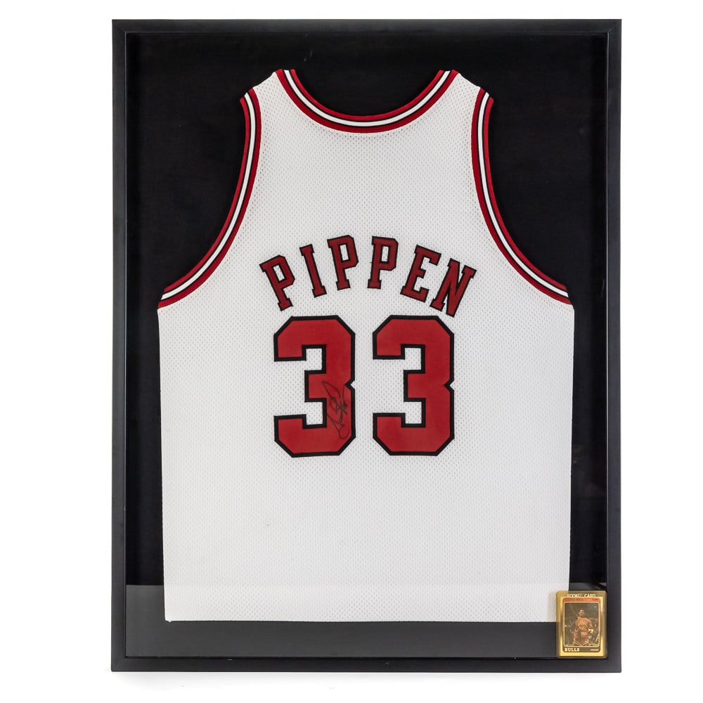 Framed Scottie Pippen AUTOGRAPHED Bulls Jersey: Framed Scottie Pippen AUTOGRAPHED Chicago Bulls #33 Jersey. Presents perfectly, approximately 39"t x 30.5"l. Perfectly accented with a bold black felt tipped signature on "3". Featured inside clean cr