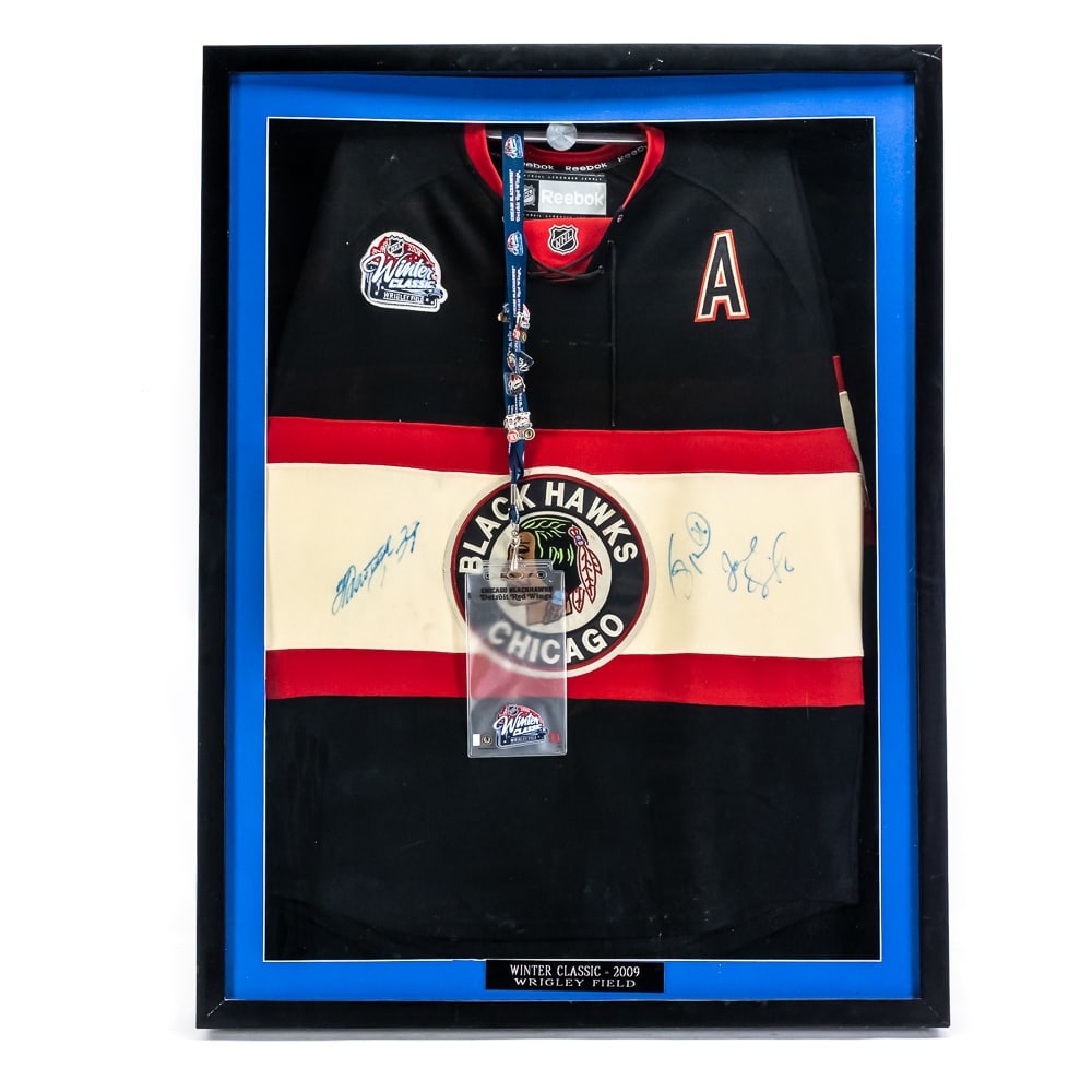 Khabibulin Bolland & Quenneville AUTOGRAPH Jersey: Winter Classic AUTOGRAPHED Chicago Blackhawks Reebok Jersey by Nikolai Khabibulin, Dave Bolland & Joel Quenneville showcased inside an attractive custom shadow box display. Hanging Jersey is