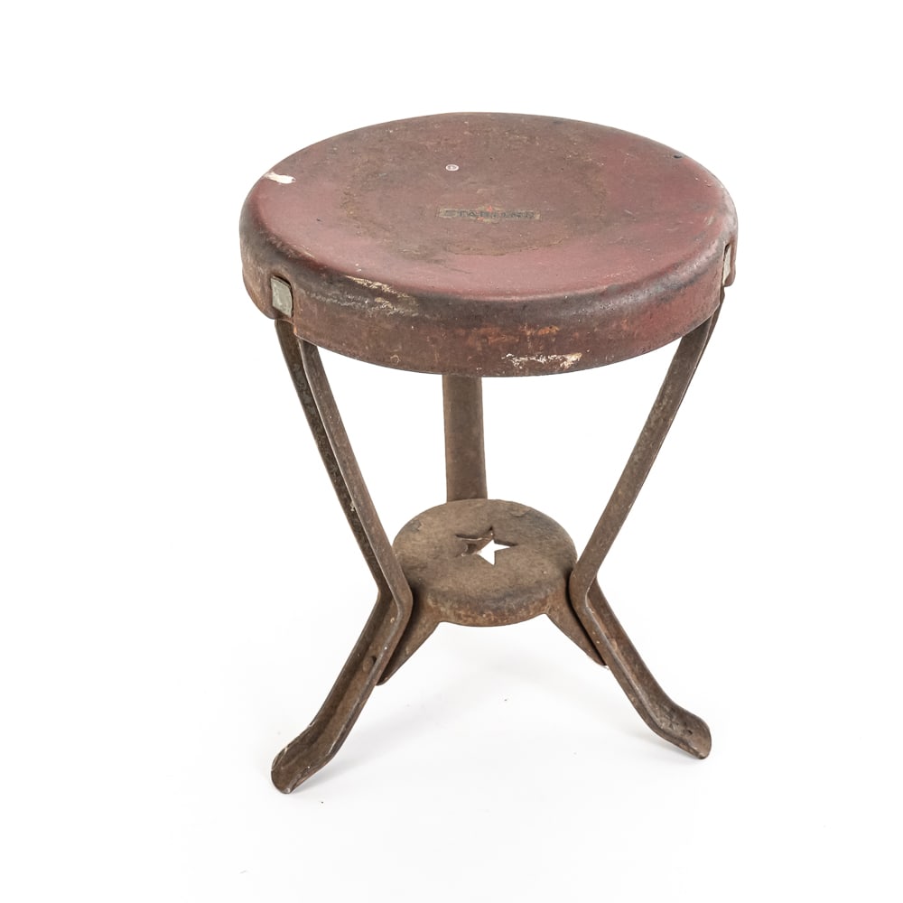 Starline 3-Legged Milking Stool: Vintage "Starline" 3-legged metal milking stool, marked on red seat and center brace features star logo, rusty and dirty, but good overall condition, 12" x 9", see photos.Own a piece of history from