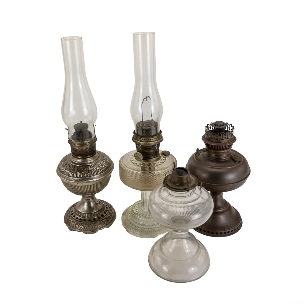 (4) Antique Kerosene Oil Lamps: (4) Antique Oil Lamps includes a nickel-plated brass kerosene oil lantern, comes with glass chimney, 12" tall w/o chimney, shows age and patina, overall good condition, an antique Aladdin Colonial