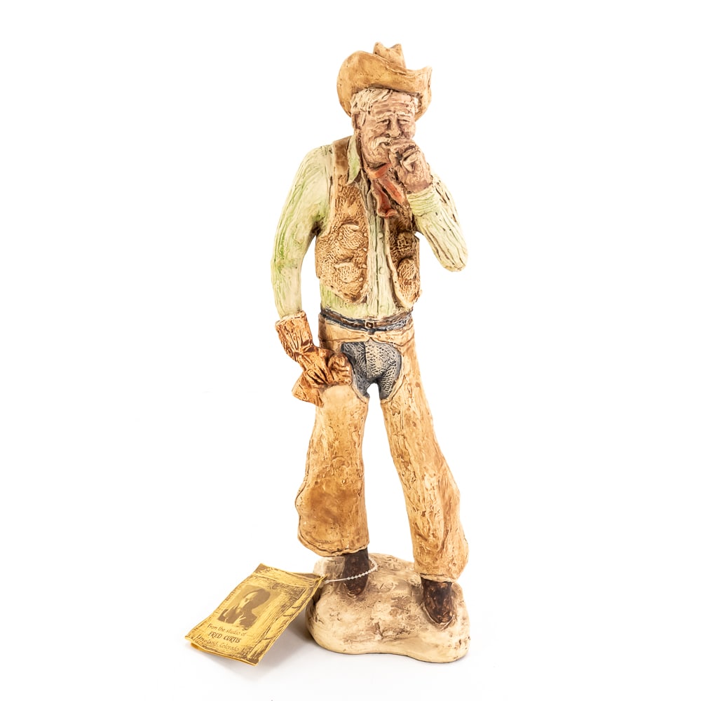 Collectible 1975 Fred Curtis Western Cowboy Statue: Collectible 1975 Fred Curtis Western Cowboy Statue, hand painted, signed, 14" tall, good condition, see photos.Own a piece of history from the Donley's Wild West Town Gift Shop!