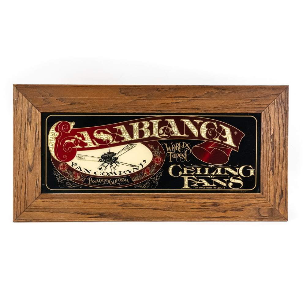 1983 Casablanca Fan Co. Framed Sign: This is a quintessential piece of corporate advertising memorabilia from the Casablanca Fan Company, a brand that defined the high-end Victorian and Art Deco revival aesthetic of the late 20th