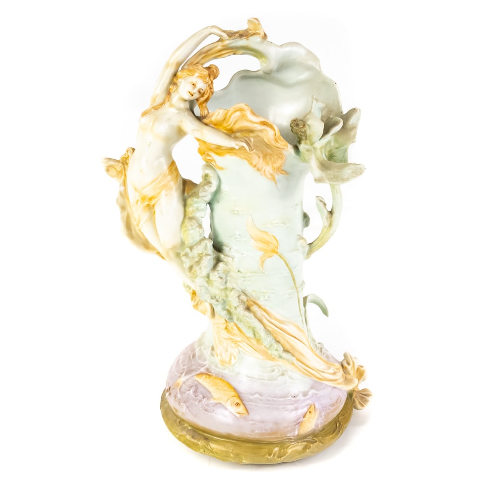 Royal Dux Majolica Art Nouveau Figural Vase: Royal Dux Majolica Art Nouveau Figural Vase, features a sculpted maiden reclining against a shell-shaped form, marine theme with fish and sea flora, crafted from porcelain bisque, characterized by a