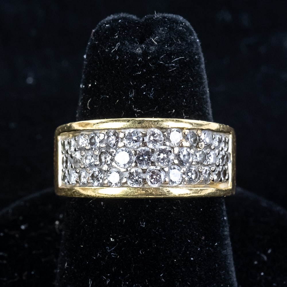 Ladies 18k Yellow Gold Pave Diamond Wedding Band: Ladies 18k yellow gold pave diamond wedding band. Approximately 1.15 +/- carats of radiant SI showcased inside a well constructed heavy 18k yellow gold 9mm setting with a total weight of 11.9 lovely g