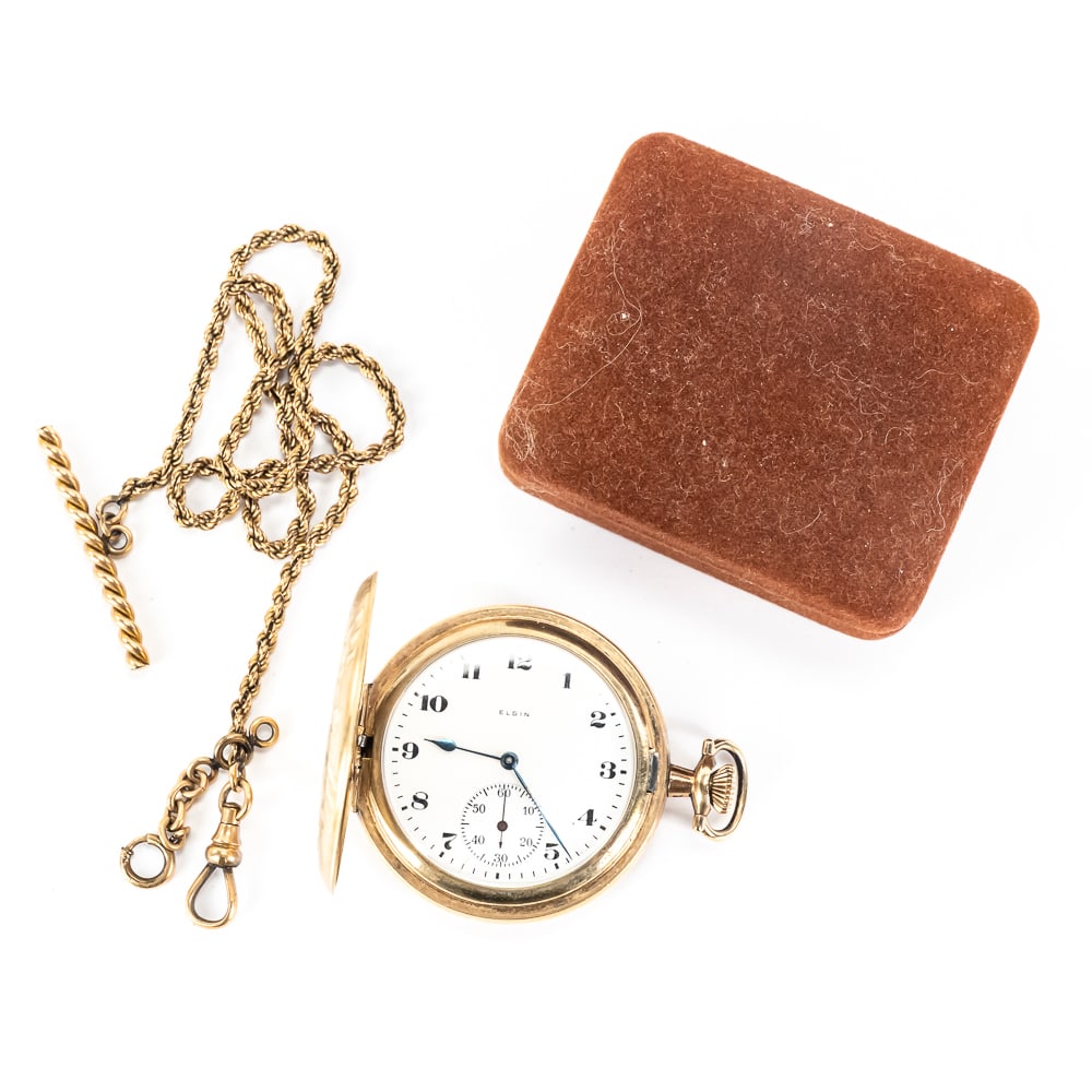 Elgin 20 Year Warranted Pocket Watch wHunters Case: Vintage Elgin 20 years warranty gold filled pocket watch showcased inside beautiful ornate hunters case. Elgin movement #23072358 featuring white porcelain dial with black Arabic numerals and second s