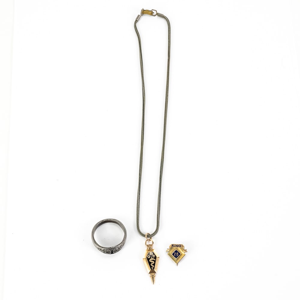10k Pin & Medical Pendant with German Cross Ring: Collection features "King 26" 10k vintage railway pin with a combined total weight of 1.7 grams; Vintage medical 10k yellow gold pendant with an approximate total weight of 3.5 grams no necklace A.J. 