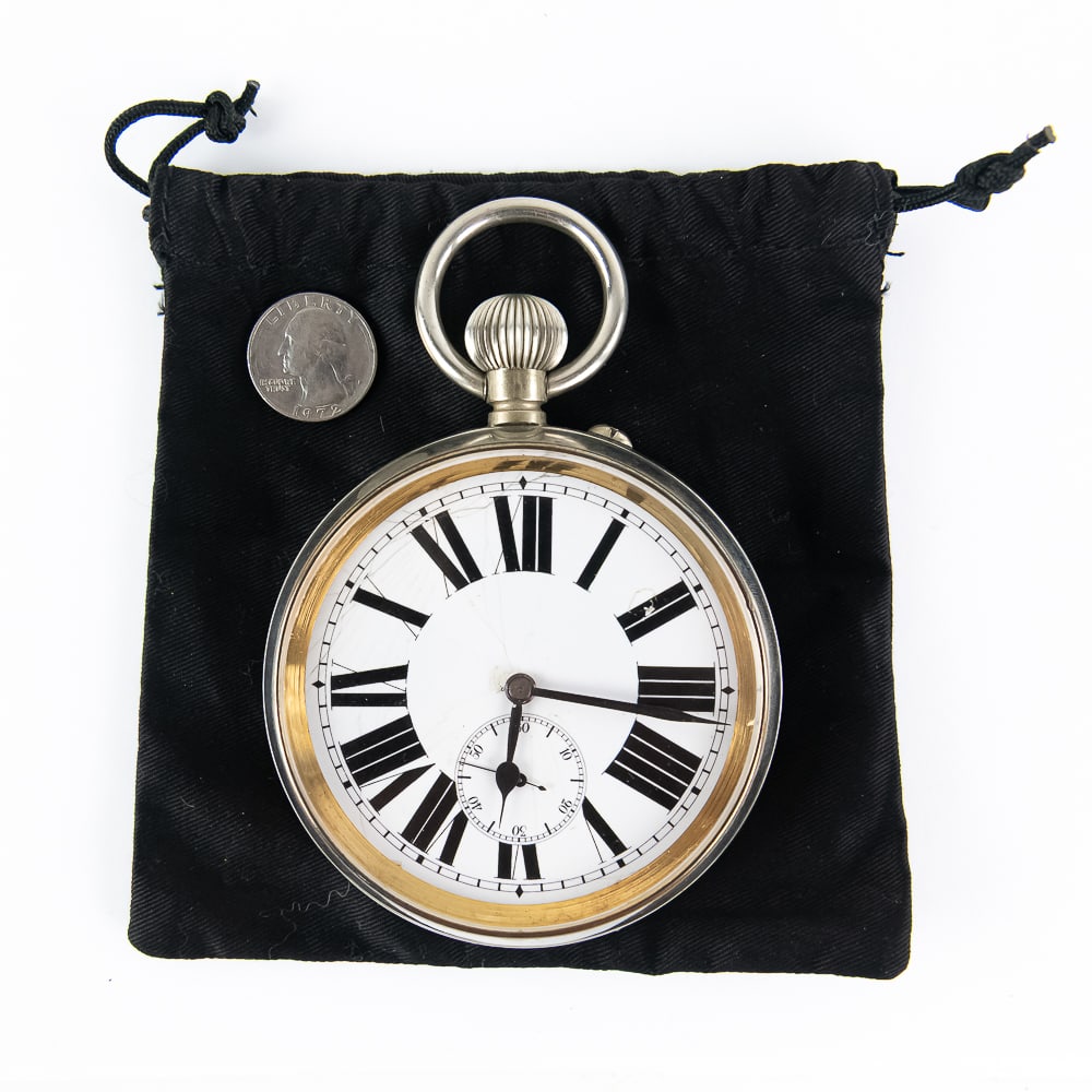 Goliath Open Face Pocket Watch w Argentan Case: Goliath open face Pocket Watch with Argentan case. Very good overall condition with minor signs of age and wear; Porcelain dial shows some cosmetic imperfections. Presents well, works, tested for a sh