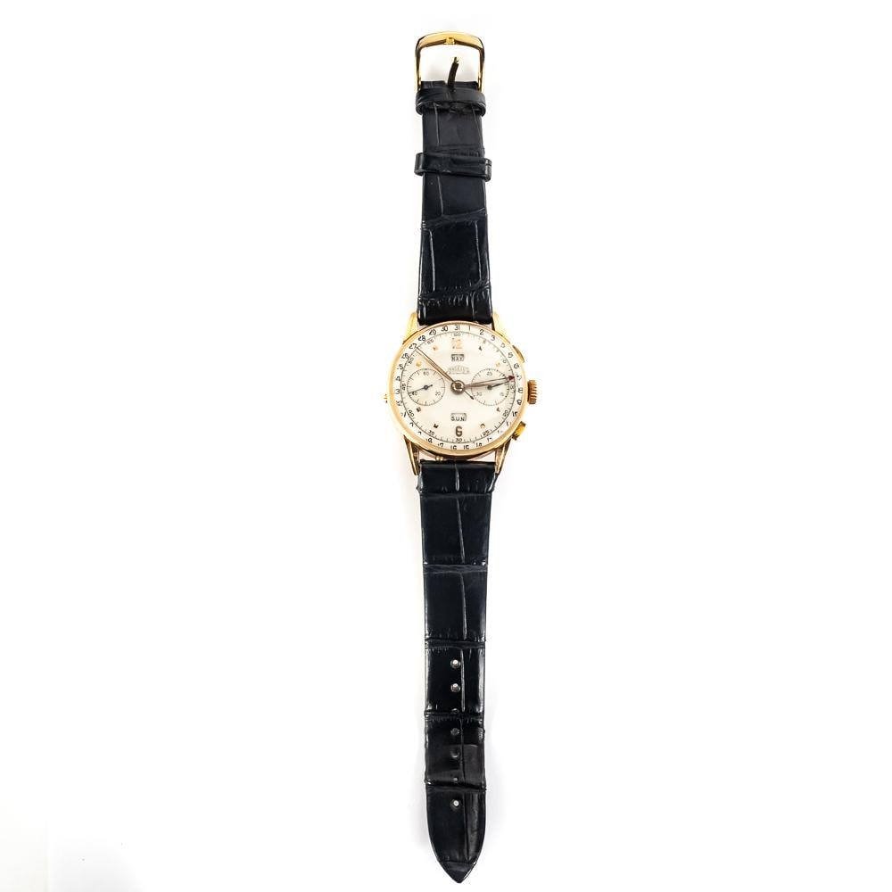 1940s 18k Gold Angelus Chronadato Chronograph: 1940s Angelus Chronadato Chronograph Swiss made timepiece featuring an 18k gold case. Presents extremely well and in very good overall condition, featured on black alligator band. Works, tested for a 