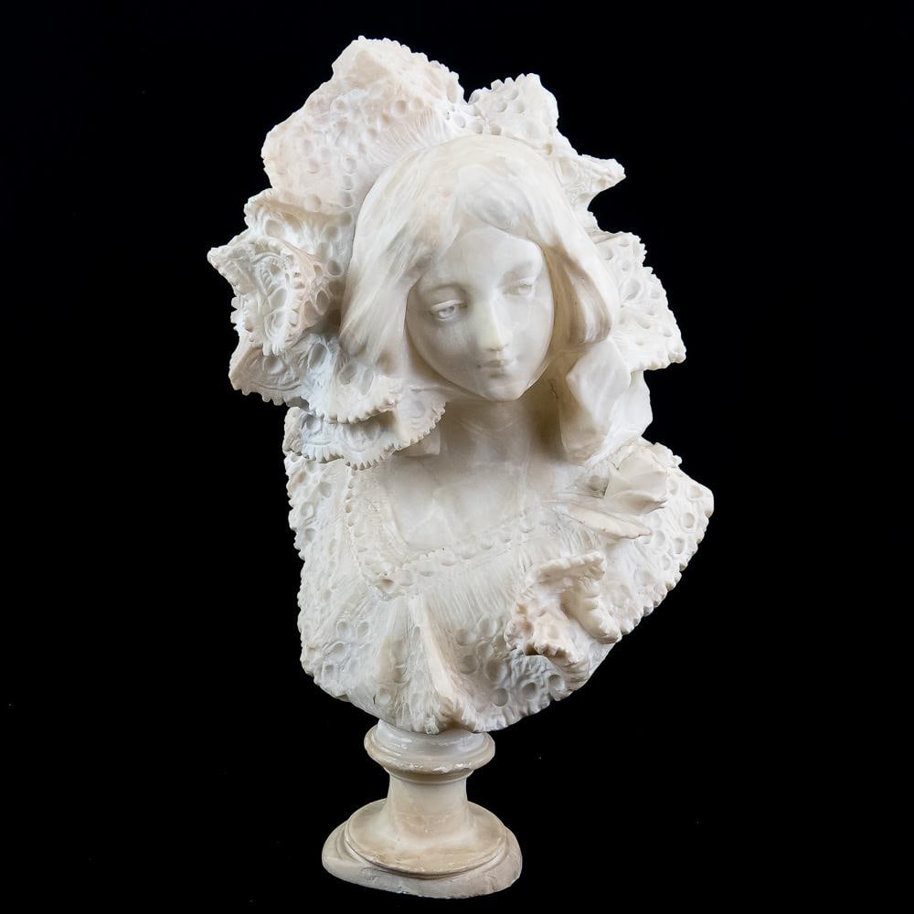 Italian Alabaster Lace Young Woman Bust: Italian Alabaster Bust, depicts a young woman in fashionable attire, featuring highly-detailed, "simulated" lace textures, hand-carved soft stone, frequently produced by Italian workshops, very minor 