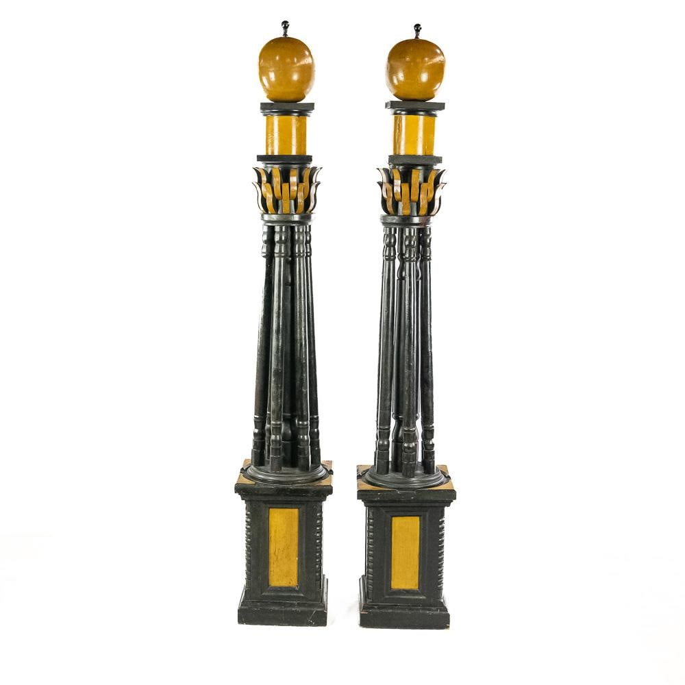 Neoclassical Ebonized Wooden Decorative Pole Pair: Antique pair of Neoclassical inspired hand carved Ebonized wooden decorative poles. Impressive color and size, present extremely well and in very good overall condition. Orb tops perfectly accented wi