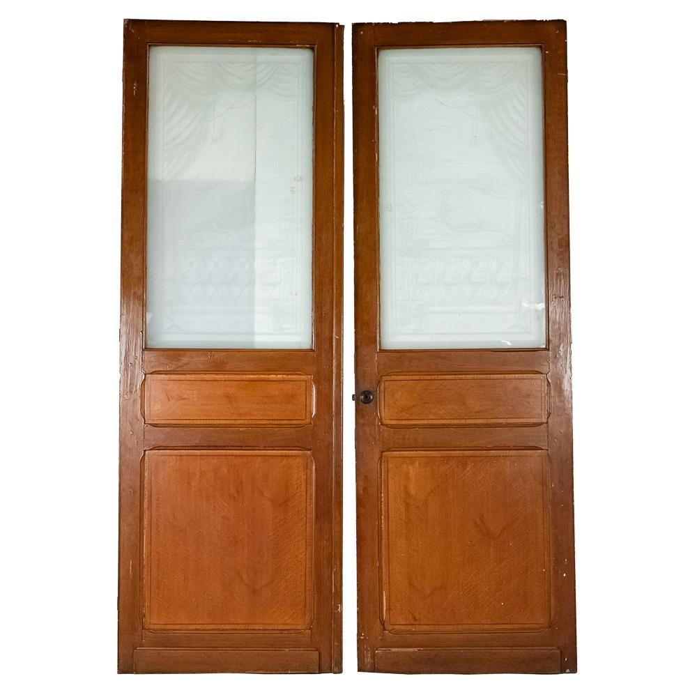 Vintage Double Doors with Etched Glass: What a stunning pair of late 19th century interior parlor doors, a true find for any lover of architectural antiques. Made of ash with birds eye maple panels on the bottom and magnificent etched glass