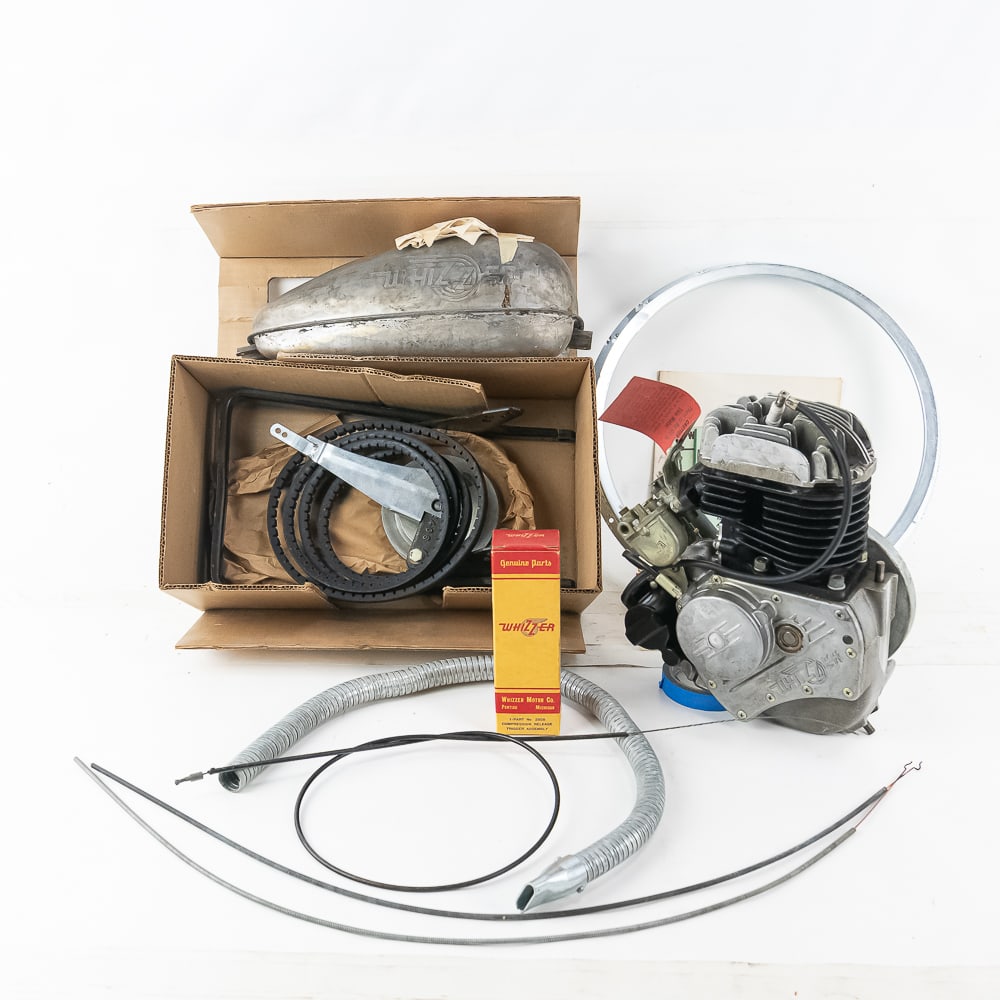NOS 1953 Whizzer Motor Bike Kit Unused: Recently discovered in an Indiana garage is a NOS 1953 Model 700 Whizzer Motor Bike kit. The original Whizzer Motor Co. of Pontiac Michigan went out of business in 1970. All remaining motor kits and p