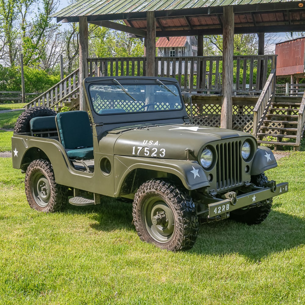 Cold War Era M38A1 Willys Jeep: A classic, Cold War-era icon! A Willys M38A1 1/4-ton 4x4 utility truck, often cited as the first "round-fender" Jeep that paved the way for the civilian CJ-5. Manufactured by Willys Motors, Inc., this