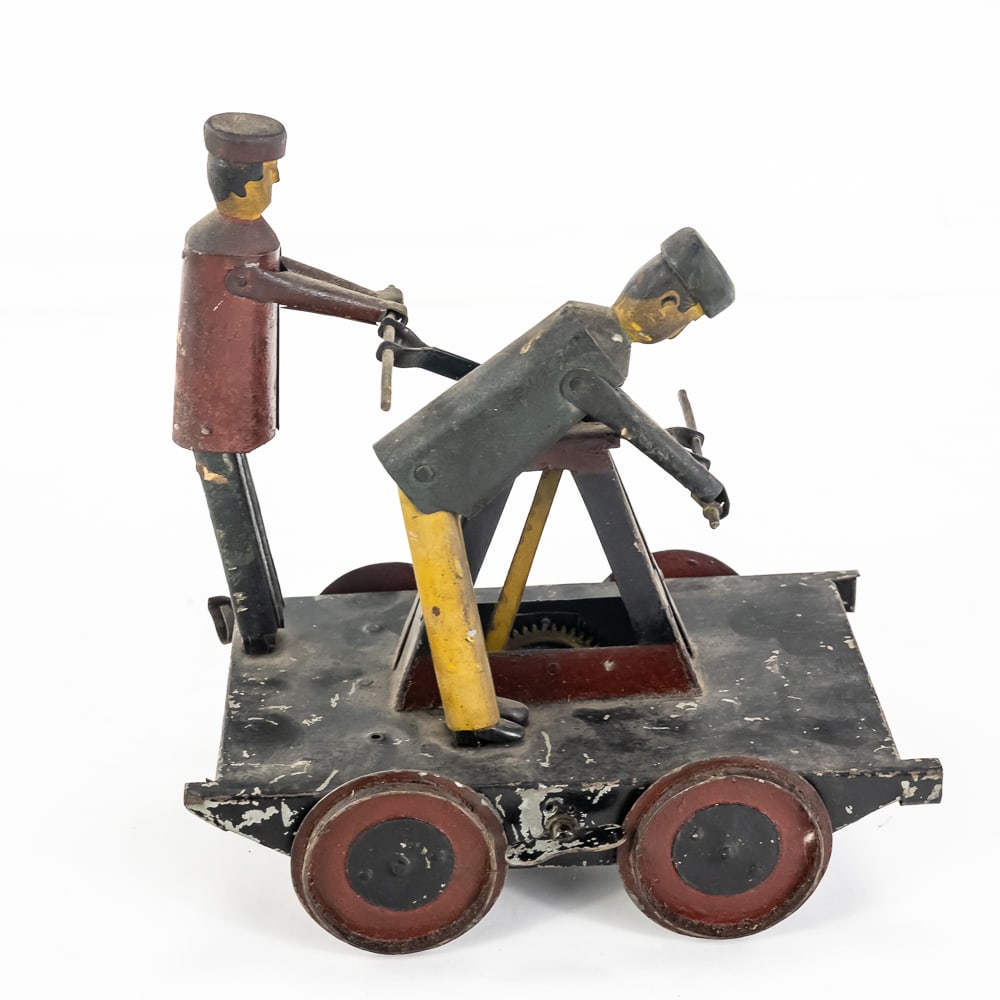 Antique Folk Art Clockwork Railway Hand Car: Antique Folk Art clockwork railroad O scale handcar featuring two articulated figures. Presents well and in good overall condition with age and wear related cosmetic imperfections including