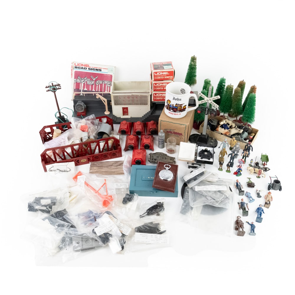 Eclectic Toy Railroad Assortment: Eclectic toy railroad collection featuring assorted Landscape, Road Signs, Marx toy 9mm Luger with box, Lionel 464 Saw Mill, Antique composition Japan & metal Lincoln Log figurines, Accessory parts