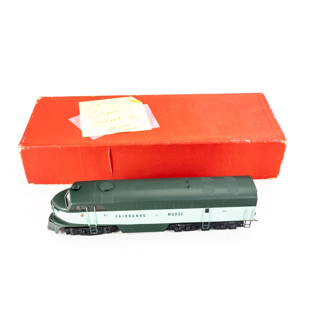'70s Red Ball F-M Fairbanks Morse Brass Locomotive: 1970s Red Ball F-M Fairbanks Morse C Liner Passenger CFB-24-5 painted brass Diesel Locomotive. Excellent overall condition with minimal cosmetic imperfections. Presents extremely well still featured