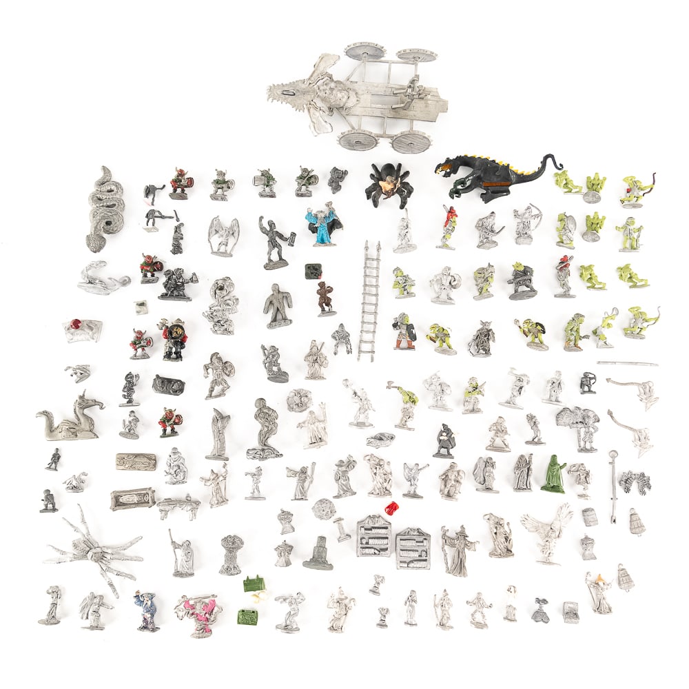 (100 +/-) Dungeons & Dragons Unpainted Figurines +: Collection of (100 +/-) assorted unpainted Dungeons & Dragons pewter Orcs Clerics Wizards and Dwarf figurines (.5"-2"); most stamped RAL PARTHA and the applicable year on the bottom side of its base.