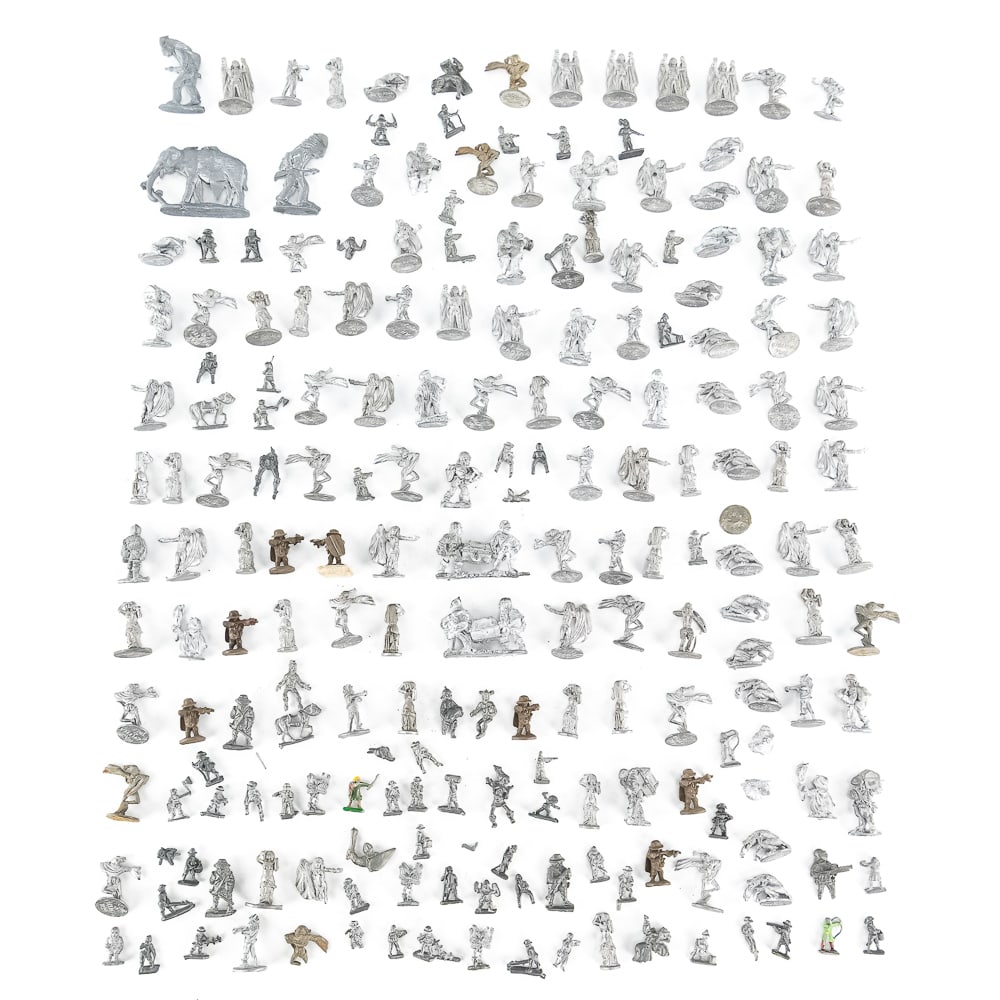 (150 +/-) Dungeons & Dragons Unpainted Figurines: Collection of (150 +/-) assorted unpainted Dungeons & Dragons pewter figurines (.5"-2"); most stamped RAL PARTHA and the applicable year on the bottom side of its base. Very good overall condition;