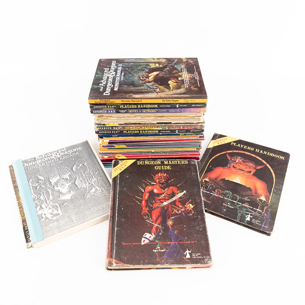Dungeons & Dragons Players Handbook Master Guide +: Assorted Dungeons & Dragons publications including Advanced D&D Players Handbooks, Masters Guides, Monster Manual II, Deities & Demigods, Adventure Models and more. Very good to good/fair overall