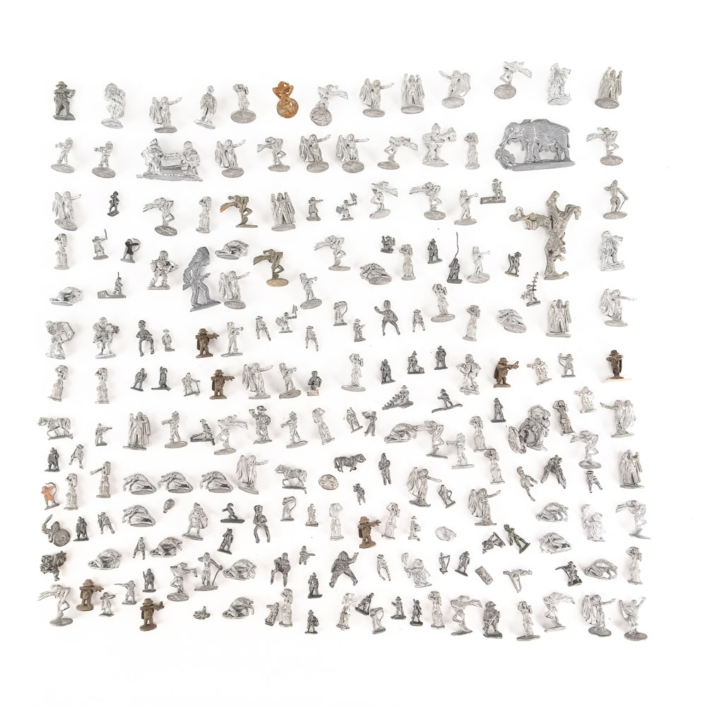 (150 +/-) Dungeons & Dragons Pewter Figurines: Collection of (150 +/-) assorted unpainted Dungeons & Dragons pewter figurines (.5"-2"); most stamped RAL PARTHA and the applicable year on the bottom side of its base. Very good overall condition;