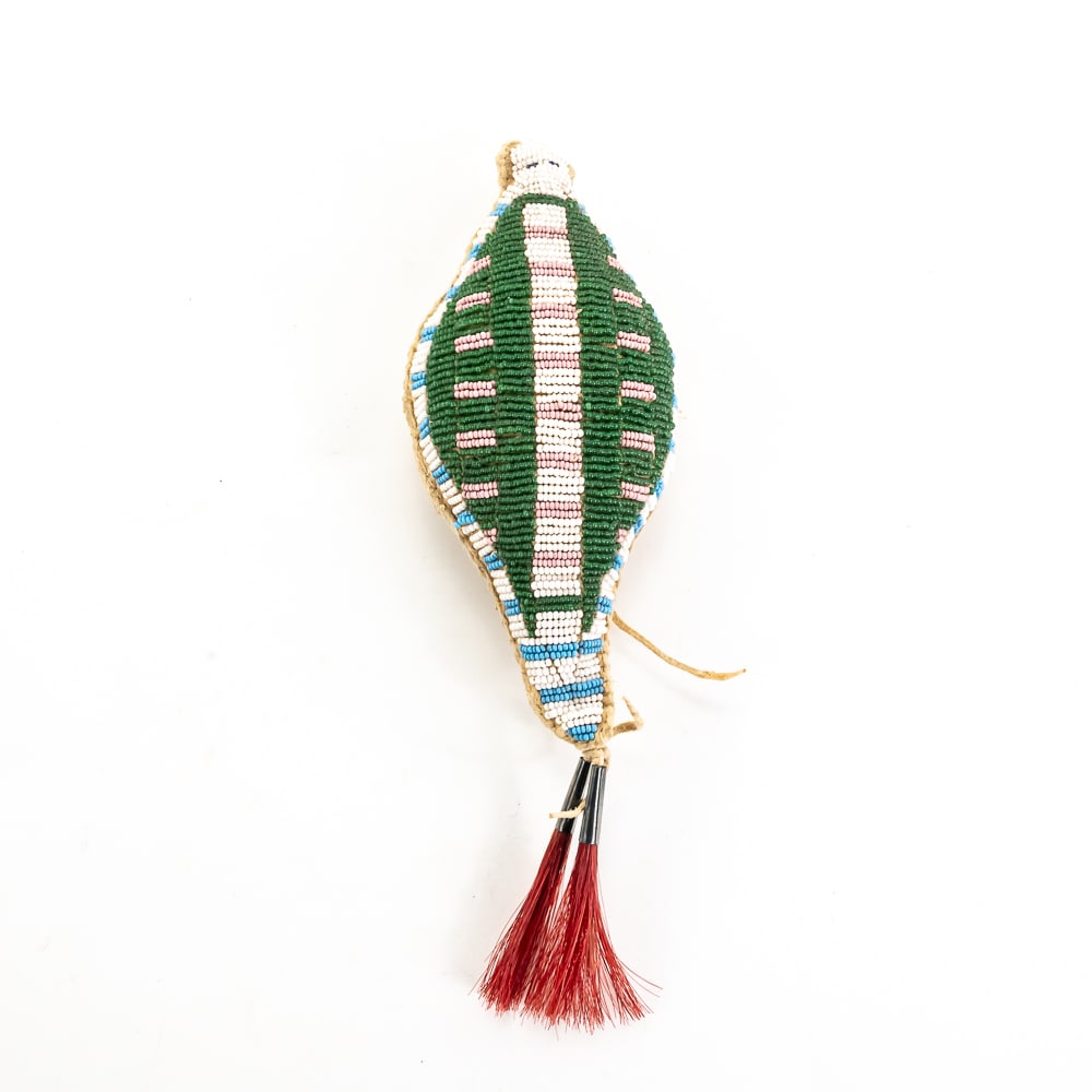 Native American Beaded Umbilical Fetish: This exceptional Plains-style umbilical fetish, most likely of Lakota (Sioux) or Northern Cheyenne origin, is a classic protective amulet traditionally crafted to house a child's umbilical cord. In
