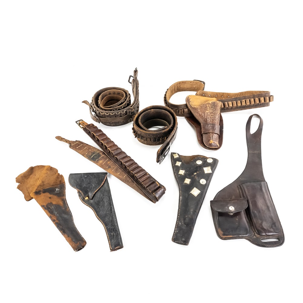 Antique RC Fox Western Pommel Pouch & Holster Lot: This premier collection of frontier-era leather is anchored by a rare utility piece bearing the deep circular maker’s stamp of R.C. Fox Maker, Belle Fourche, South Dakota. Identifying a
