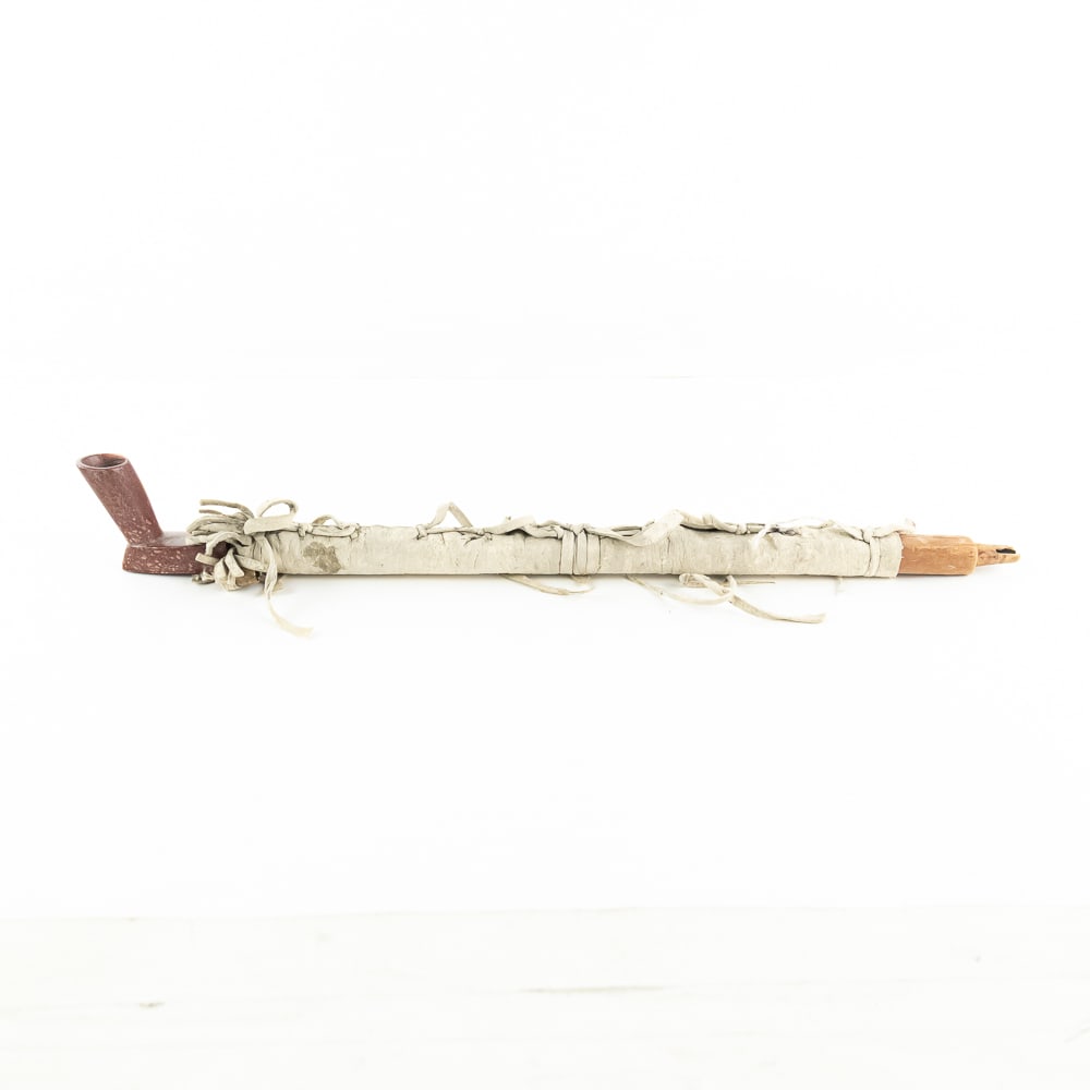Native American Catlinite Pipe & Stem: This ceremonial-style "calumet" features a classic T-shaped pipe bowl hand-carved from red catlinite, a stone historically quarried from the Great Plains region and prized for its ability to