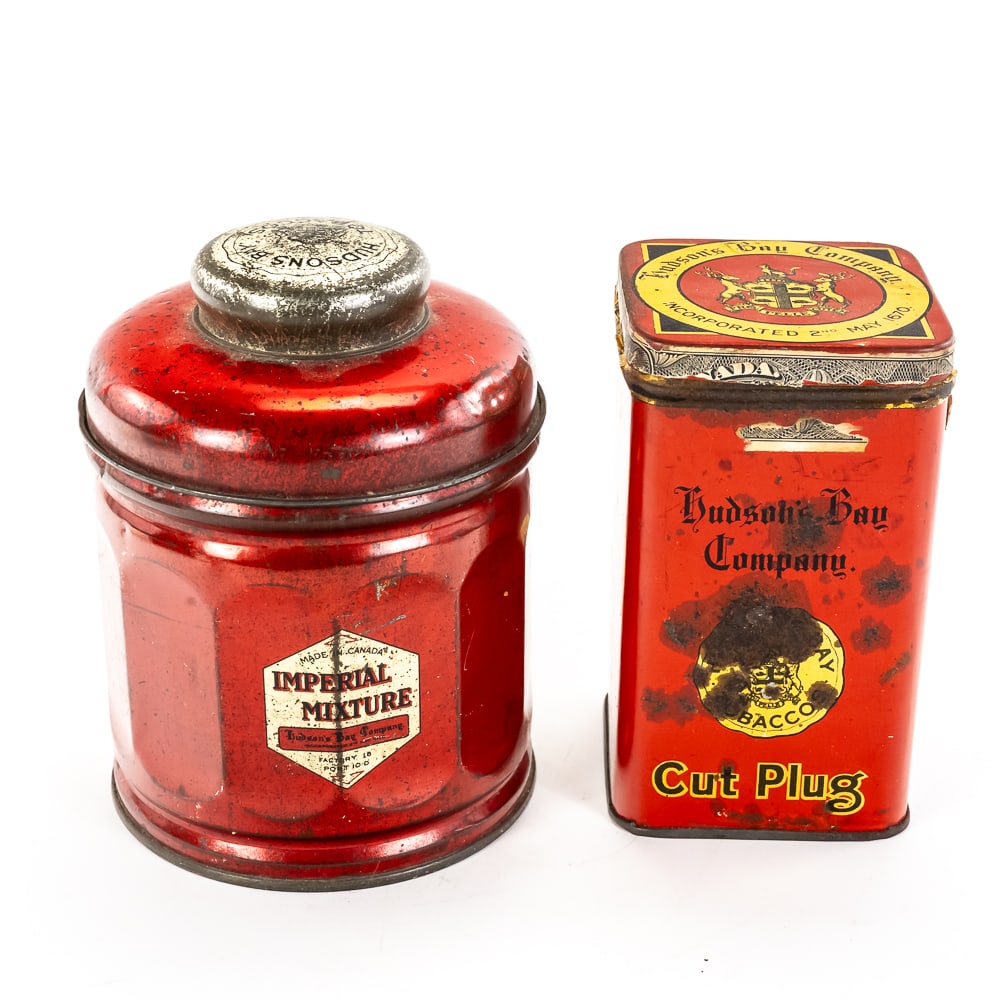 Hudson’s Bay Company Tobacco Tin Set: These early 20th-century lithographed tobacco tins represent the storied history of "The Governor and Company of Adventurers of England Trading into Hudson's Bay." The set includes a round "Imperial