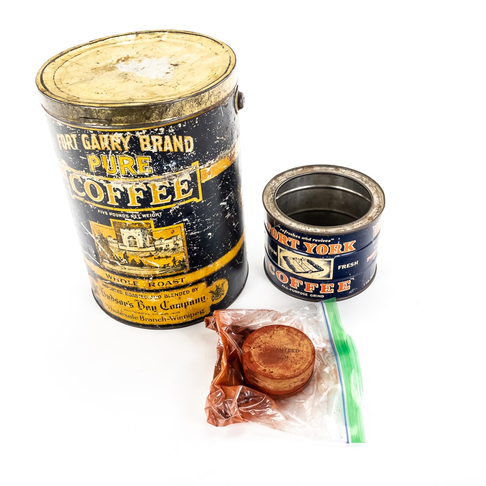Antique Hudson’s Bay & Fort York Tins: Wonderful grouping of early Canadian mercantile history featuring the legendary Hudson’s Bay Company. This lot includes a substantial 5-lb "Fort Garry Brand" whole roast coffee tin from the HBC